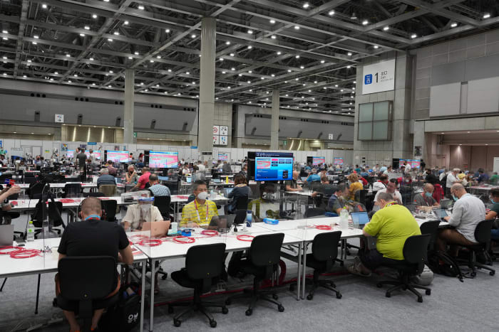 The press and photographers' workroom at the Main Press Center in Tokyo.